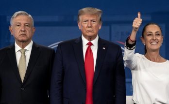 trump stands between Mexican leaders at formal diplomatic summit with blue backdrop